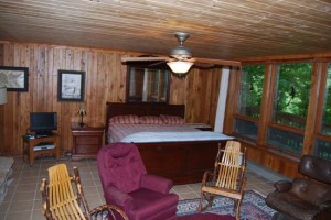 King sized Bed and lots of seating in Fireplace Room